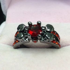Woman's hematite and red stone ring Sz8